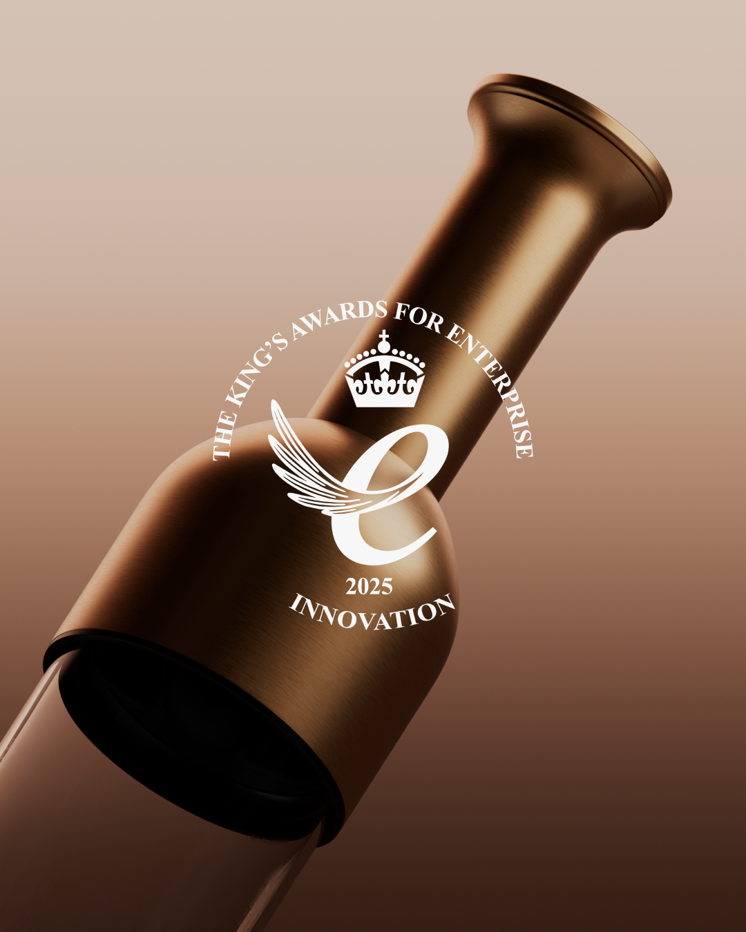 Brass satin ETO wine decanter  with 'King's Awards for Enterprise 2025 Innovation' logo on a brown gradient background
